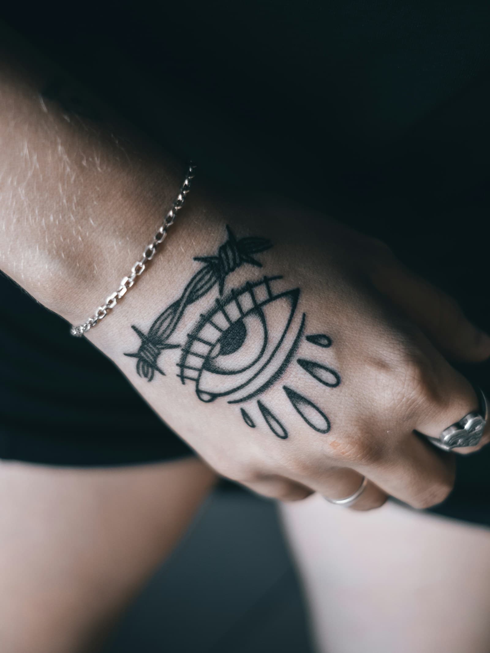 Minimalist fine linework by Tahta, The Road Ink Tattoo Ubud